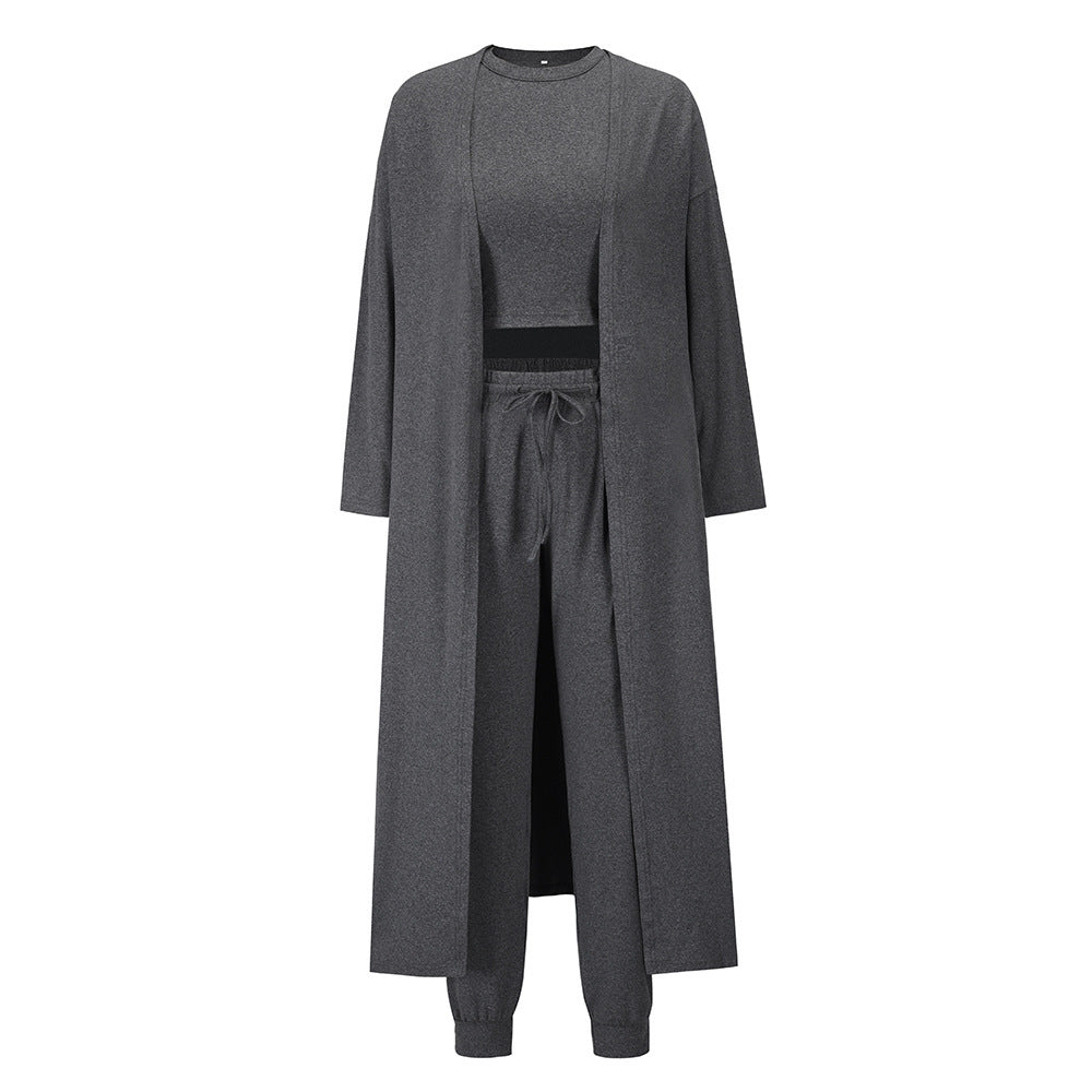 Contemporary Elegance: Women’s Fitted Knit Vest & Trousers Ensemble