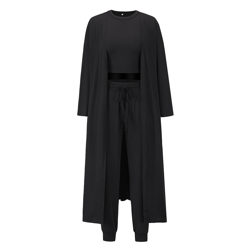 Contemporary Elegance: Women’s Fitted Knit Vest & Trousers Ensemble